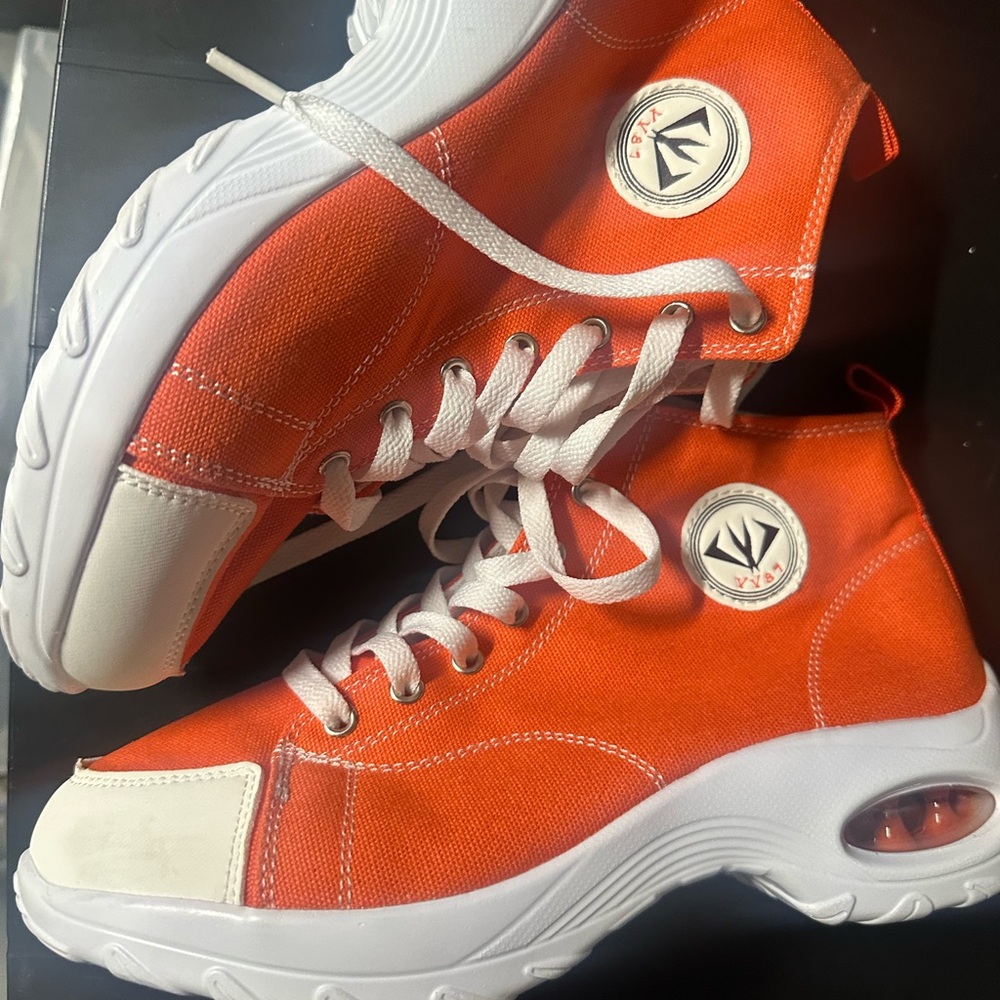 Women’s Orange high top shoes, Size 9.5